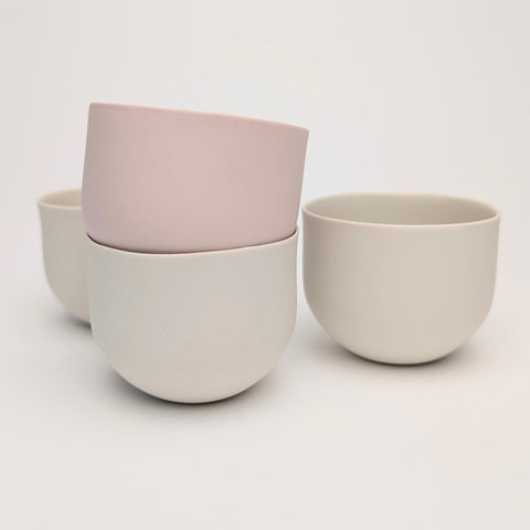 Vintage white and pink porcelain coffee cups. Handmade in Berlin.